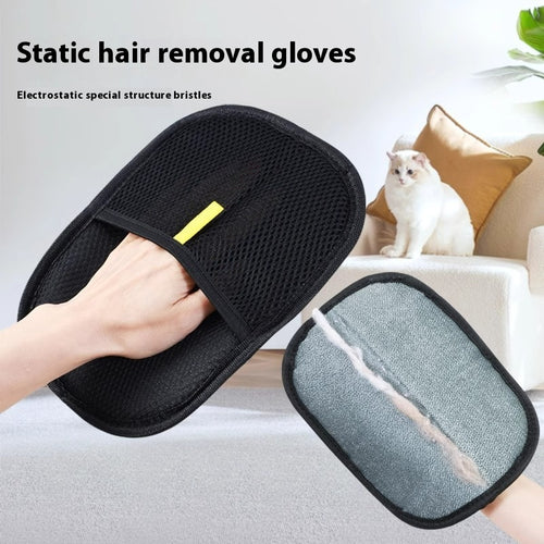 Black reusable pet-hair removal mitt with gray cleaning surface and yellow finger loop